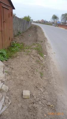 Жительница рязанского села подтопила землю соседа