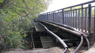 Начался ремонт тротуара на мосту через реку Трубеж в Рязани